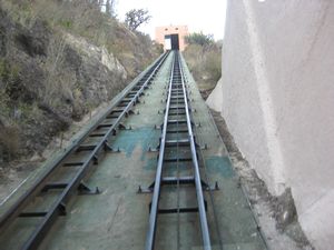 Incline railway - funicular takes passengers to a mountain above the city.