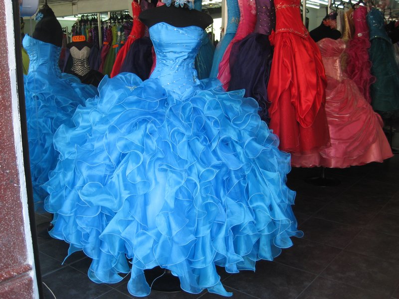 Shops along one street specialized in wedding and quinceanera dresses. 