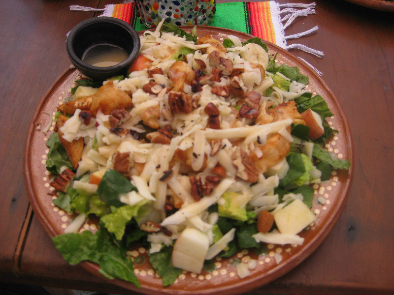In addition to the lettuce and optional chunks of chicken, this awesome salad had pecans, sliced bananas, kiwi, apples and I don't remember what else. 