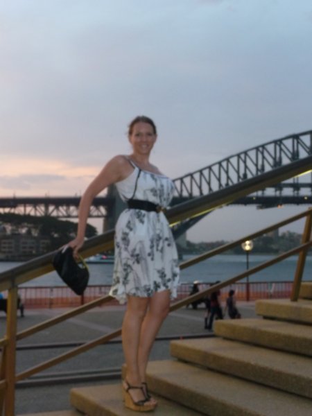 In front of the Opera house with Harbour bridge in the backdrop
