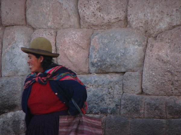 Local woman and the Inca wall