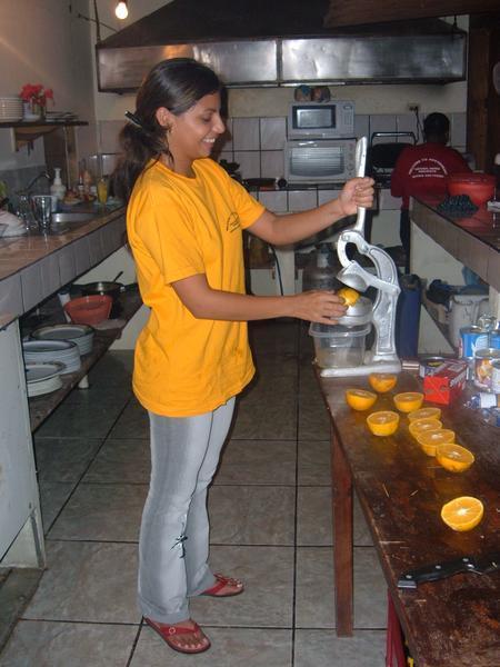 Jennifer making orange juice