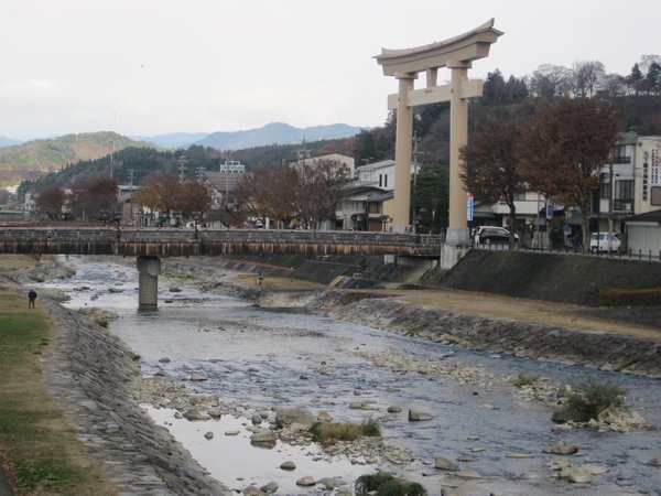 Torii on the river in Takayama