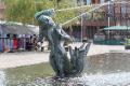 Gotta love the merman barehand salmon fishing statues in the fountain in Halmstad