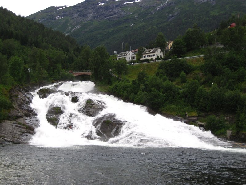 Waterfall into Geiranger fjord from Hellsylt