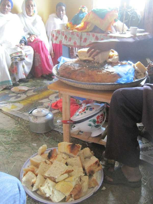 Part of the Ethiopian culture is to graciously invite those around you to partake in your food.  Up at En Toto we were invited to some kind of ceremony.  We shared a piece of bread with this family