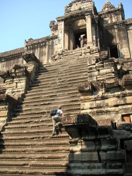 Climbing to the top of Angkor Wat