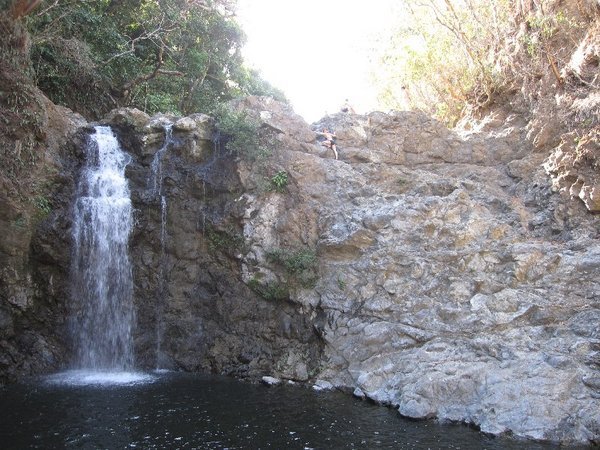 climbing beside waterfalls