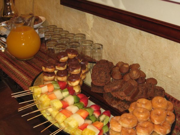 Fruit kabobs, FRESH Orange Juice and mini-doughnuts