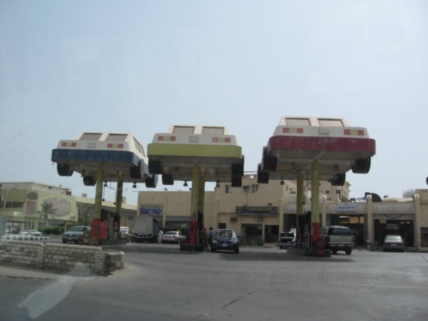 Gas Station with Cars as an awning
