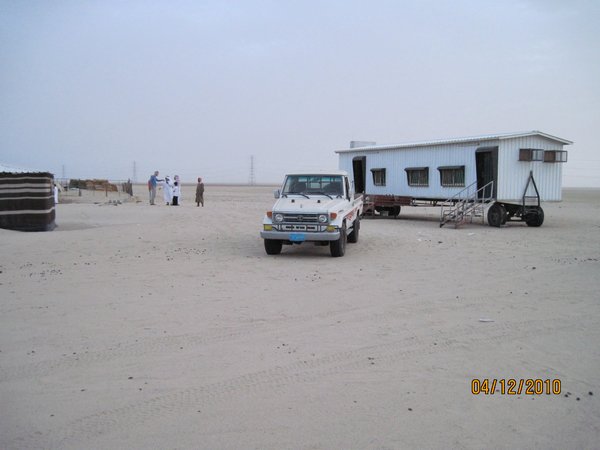 The trailer where the camel caretaker lives
