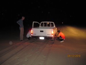 The pickup gets stuck in the desert
