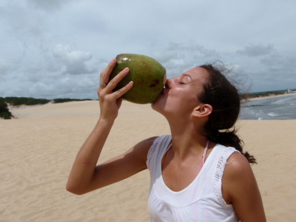 Me drinking a coconut