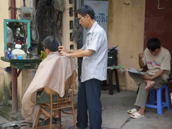 Barber on the pavement