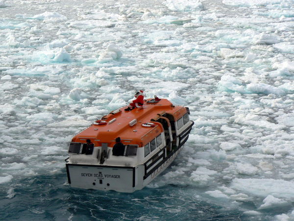 The tender motors through the ice