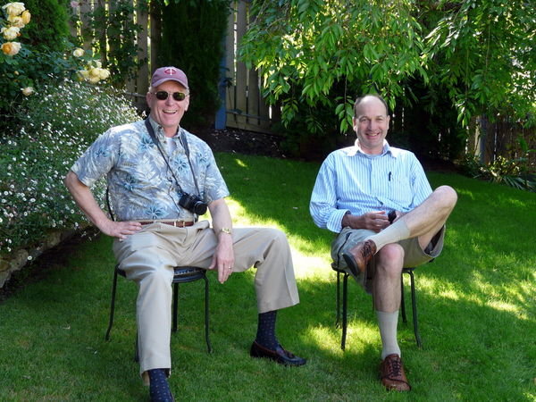 Alan and Robert rest in the garden