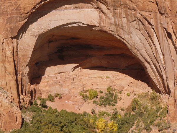 A 900-year-old pueblo sits in the shade of a canyon