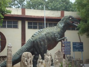 Statues threatened by dinosaur