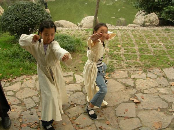 Little people being bored and doing kungfu