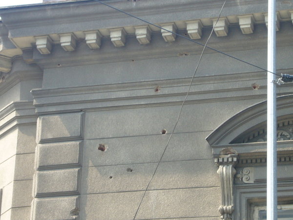 bullet holes in building 