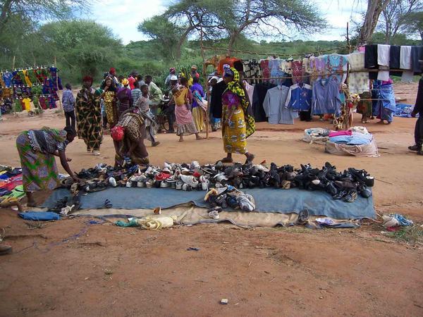Piles of mitumba shoes