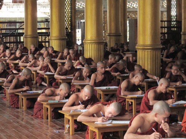 Monks taking exams at monastery
