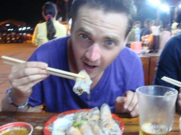 Me eating delicious rolls - Hoi An food stalls