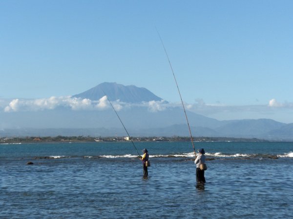 Fishermen with Mount Agung in the background