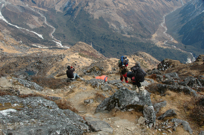 A group of porters coming up the steep trail