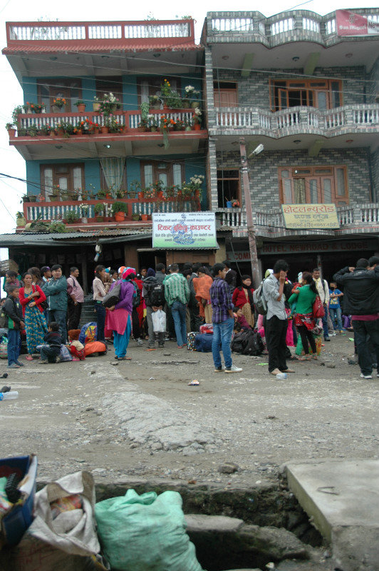 People queuing up outside jeep/bus ticket office in Hile