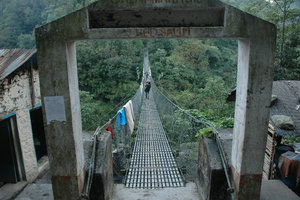 Crossing the Dudh Koshi River on the suspension bridge between Khari Kola and Nunthala 