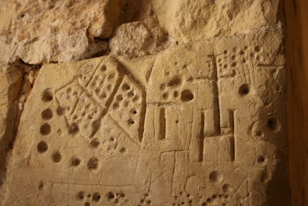 12 Carving of cross and dice