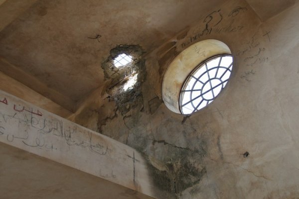 The hole where the church took a direct missile hit - Quneitra, Syria