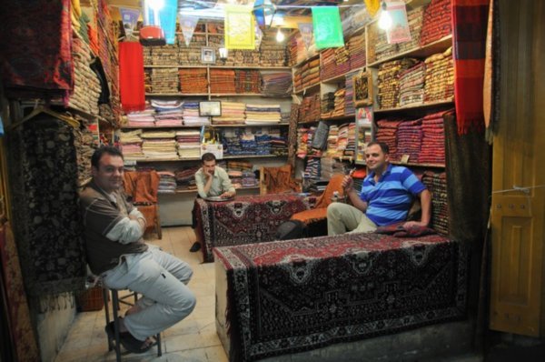 The colours of a silk seller - Aleppo souq, Syria