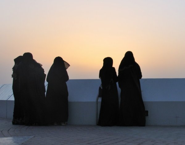 Young ladies watching the sunset - Kuwait City