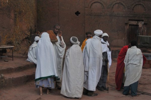 Kissing of the bible after readings at Bete Mariam - Lalibela, Ethiopia