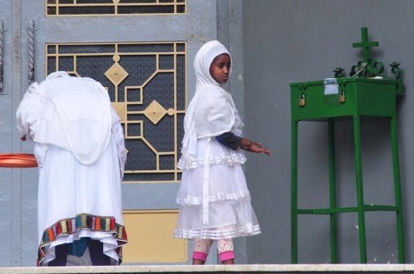 Daughter and Mother in Prayer - Holy Trinity Cathedral, Addis Ababa, Ethiopia