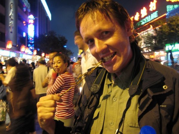 The first bite - Donghuamen Night Market, Beijing