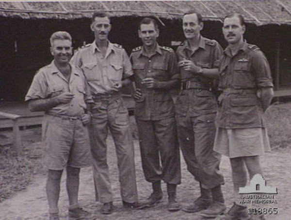 Taken outside of former Japanese Headquarters at Nakom Paton, Thailand, after war on 19 September 1945. Lt Dumbrell is second from right.
