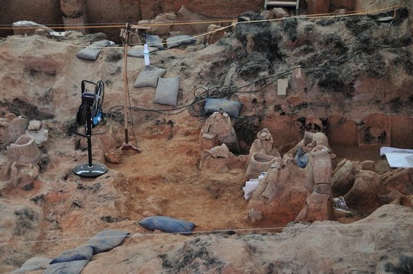Continuing excavations within pit one - The Museum of Qin Shi Huang Terracotta Warriors and Horses, Xi'an, China