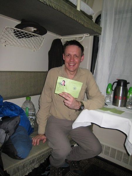 Proudly displaying my visa on the train - I'm off to North Korea!