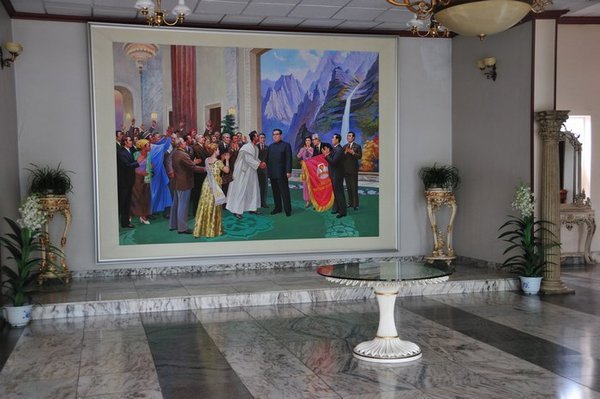 Foyer of the March 08 Hotel, Sariwon, North Korea  - complete with Great Leader picture.