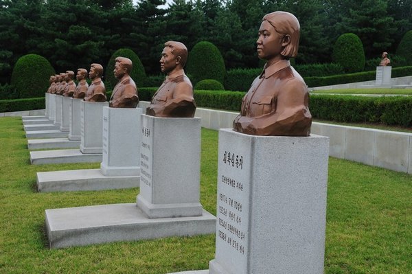 Bronze tributes at the Revolutionary Martyrs Cemetery - Pyongyang, North Korea