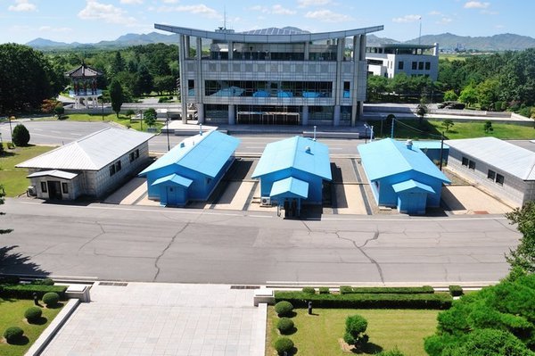 The North/South Korean border with Freedom House at the back - Panmunjom, North Korea