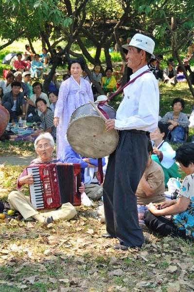 Musicians peform at Moranbong Hill in Pyongyang on National Day - North Korea