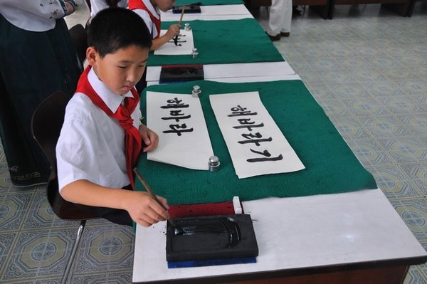 Calligraphy classes at the Mangyongdae Children's Palace - Pyongyang, North Korea