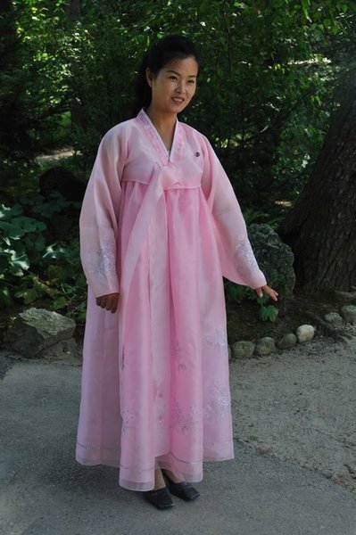 An elegant local guide at the Pohyon Temple - Mt Myhongyang, North Korea 