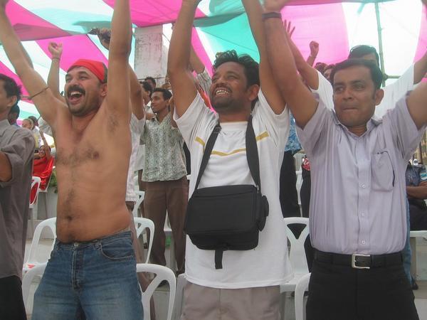 Bangladeshi supporters celebrate as Shahriar Nafees reaches his century - Dhaka