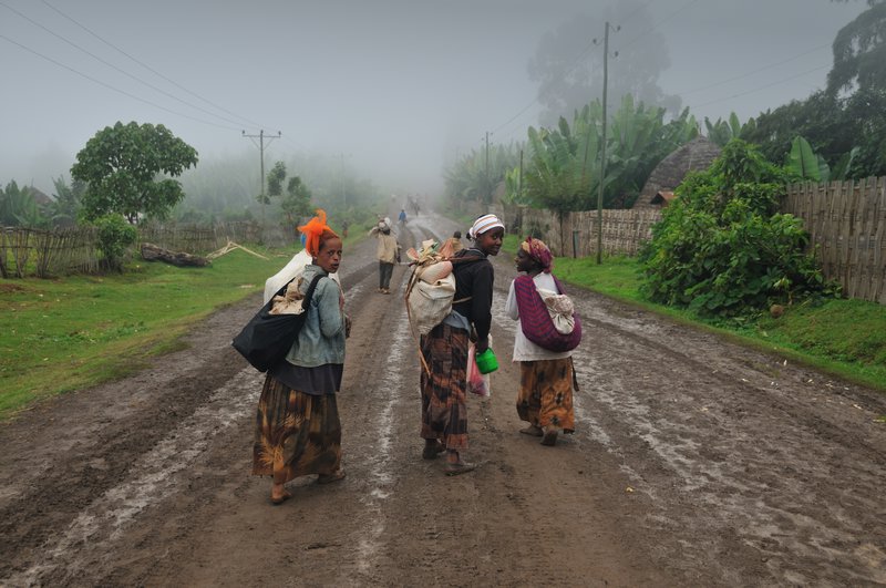 Walking along the misty road - Dorze, Ethiopia