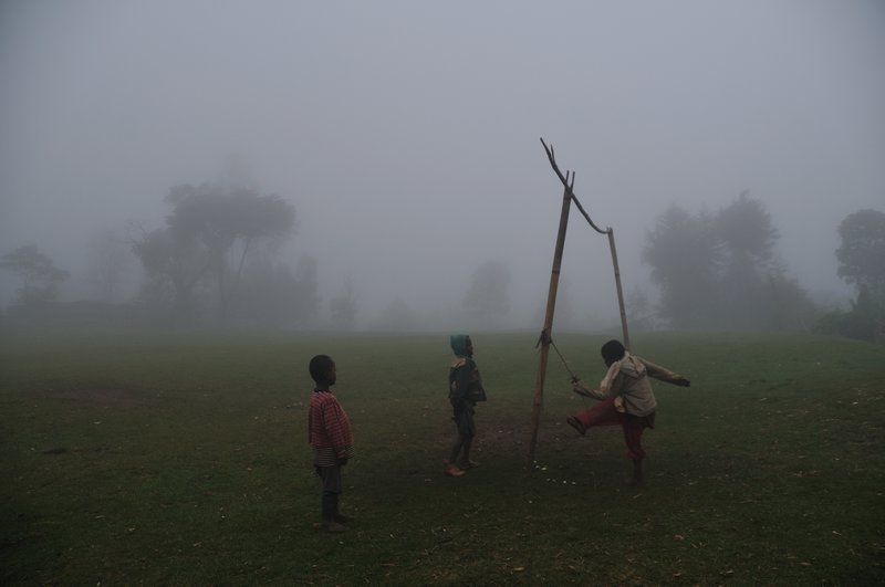 Children playing 'kick-ball' - Dorze, Ethiopia
